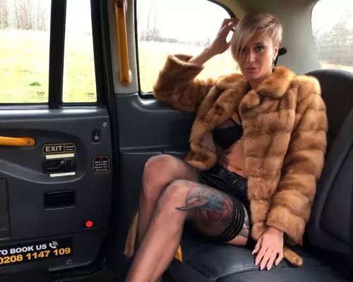 Short haired tattooed blonde fucked